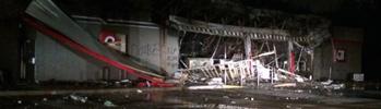 A QuikTrip convenience store was destroyed by a fire during protests and looting in Ferguson, Mo.